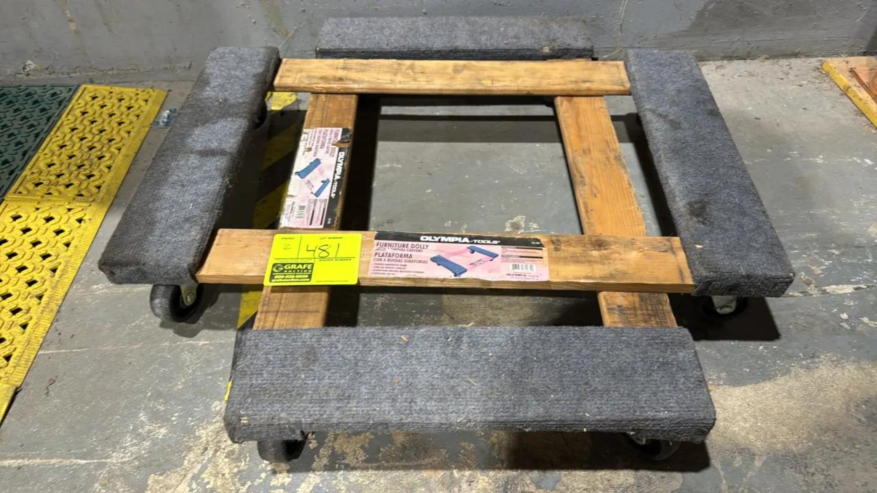 Olympia Tools 85-185 furniture dollies. Features padded hardwood frame with carpeted ends and 1,000 lb weight capacity. Mounted on 4 swivel casters.