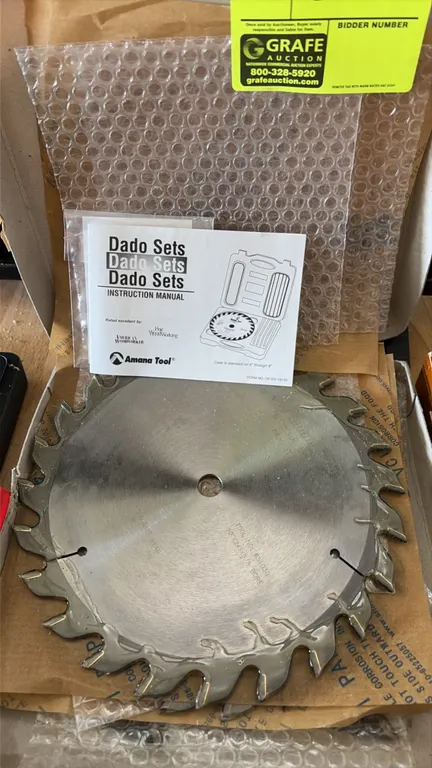 Amana Tool 651030 10" dado blade set. Features 24-tooth carbide-tipped blades, chippers, and instruction manual. 10" diameter with 5/8" bore.