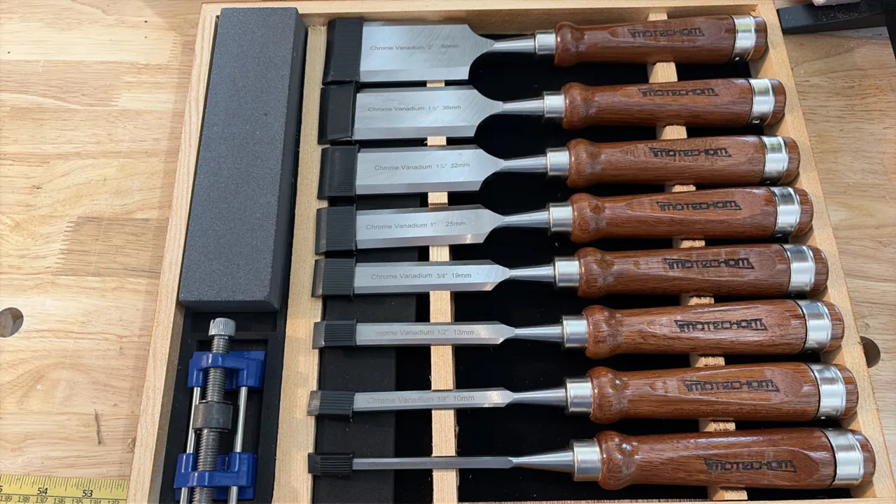 IMOTECHOM 8-piece wood chisel set. Features chrome vanadium steel blades, wooden handles with metal strike caps, and protective edge covers. Includes