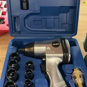 Pneumatic tool set. Includes Dura-Block pneumatic impact wrench kit with (10) impact sockets, extension bar, mini in-line oiler, and blow-molded case.
