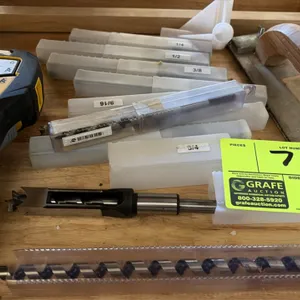 Workshop accessories package lot. Includes a Brady M210 handheld label printer, assorted mortising chisel bits in protective sleeves, Irwin auger and 