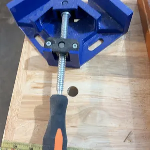 Right angle corner clamps. Features 90-degree clamping angle with adjustable swing jaw, threaded steel spindle, ergonomic rubberized grip handle, and 