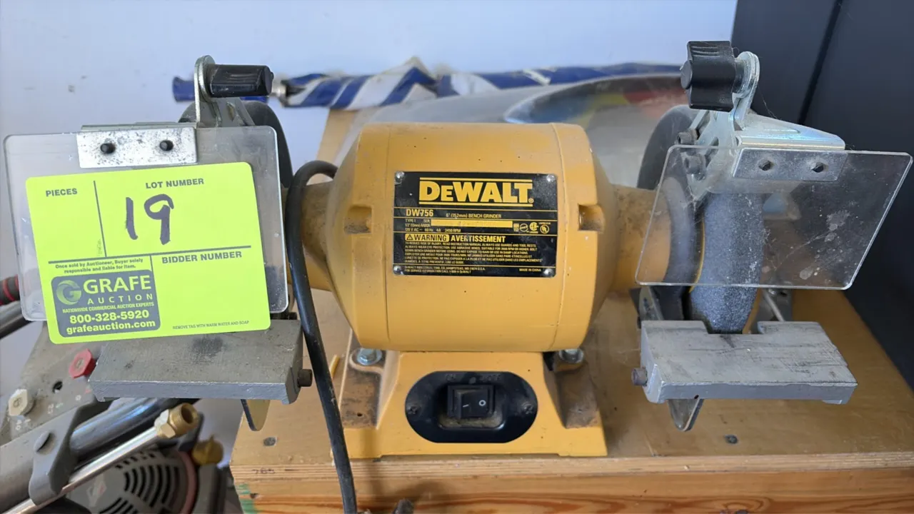 DeWalt DW756 6" bench grinder. Features dual 6" grinding wheels, clear eye shields, adjustable tool rests, and 1/2" arbor. 3,450 RPM. Electrical: 120V