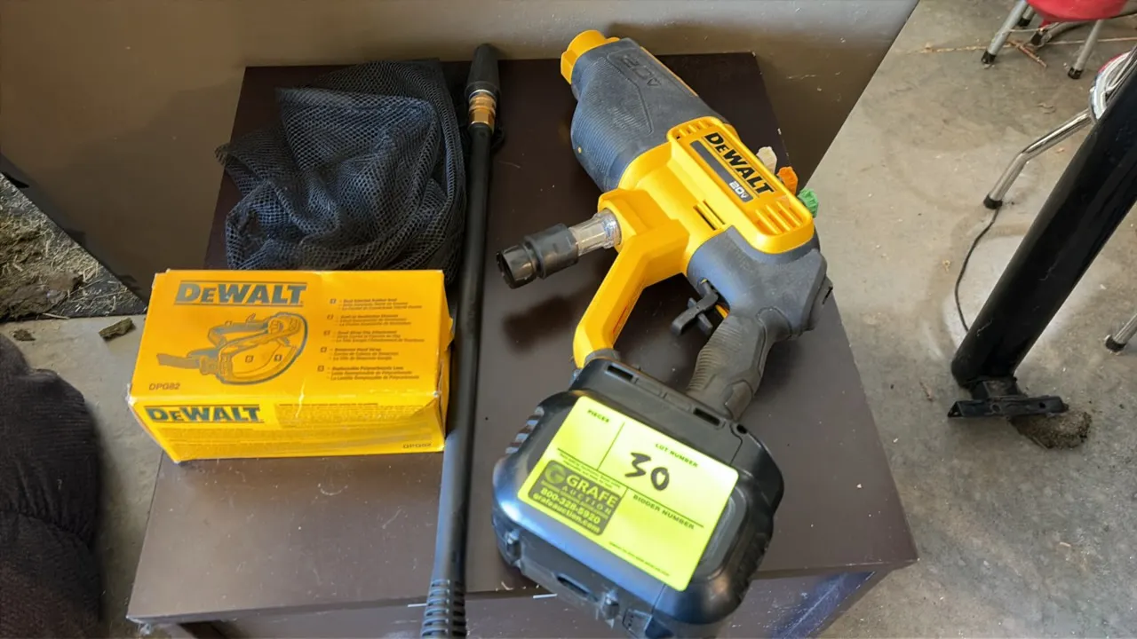 DeWalt DCPW550 20V cordless power cleaner. Features onboard nozzle storage and quick-connect water inlet. Includes spray wand, spray nozzles, mesh sto