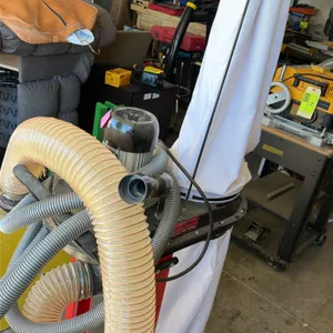 Bucktool DC50 mobile dust collector. Features 1.2 HP motor, 750 CFM air flow, 3450 RPM, and 4" hose diameter. Includes upper filter bag, lower collect