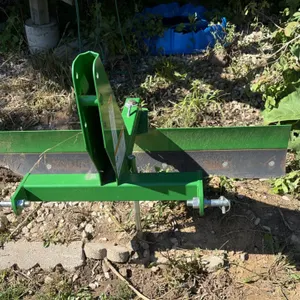 John Deere Frontier RB2060L 60" rear scraper blade. Features 3-point hitch mounting with hitch pins, multi-position angle adjustment, reversible cutti