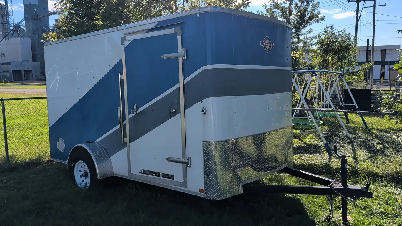 2020 Carry-On Trailer 6X12CGRCM enclosed cargo trailer. Features single axle, side entry door with exterior latch, rear drop-down ramp door, front dia