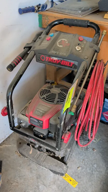 Troy-Bilt XP gas pressure washer. Powered by a Briggs & Stratton Professional 190cc engine. Rated for 3,000 max PSI and 2.7 max GPM. Includes spray wa