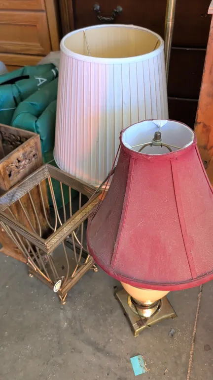 Assorted lamps and stands. Includes (2) table lamps with fabric shades (one large lamp with a pleated shade and one accent lamp with a burgundy shade)