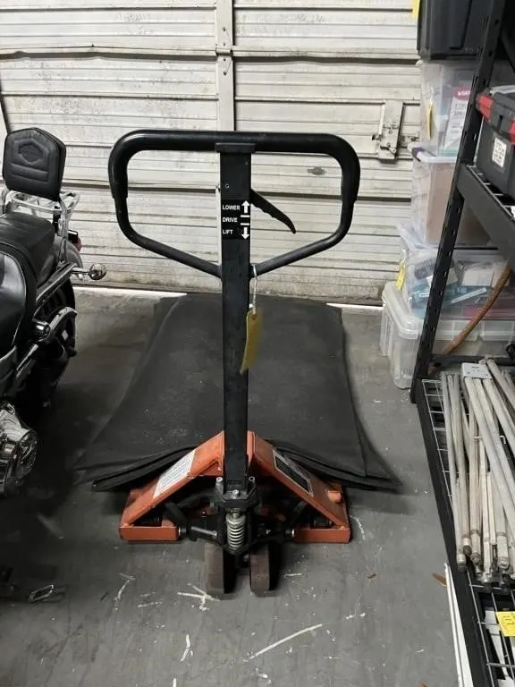ORANGE PALLET JACK (NEEDS SEALS)