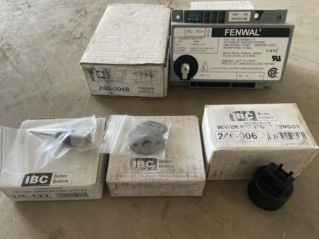 2 Boxes Of Various NEW IBC Better Boilers Supplies