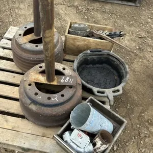 STEEL POSTS ON RIMS, OIL DRAIN TUB AND MISC