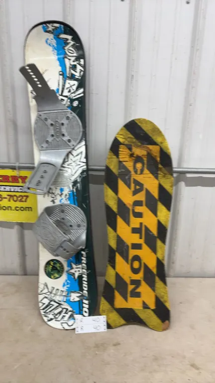 Freeride 110 Snowboard with Bindings and “Caution" Rawlings Skateboard