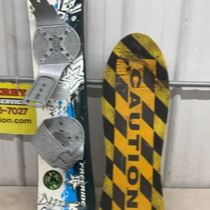 Freeride 110 Snowboard with Bindings and “Caution" Rawlings Skateboard