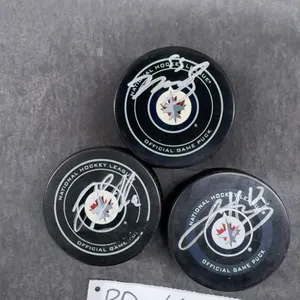 Winnipeg Jets Mark Scheifele, Jacob Trouba, And Jansen Harkins Autographed Game Pucks