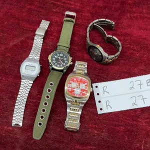 Four Watches: Tonino Lamborghini, Discovery, and Two Unbranded Watches