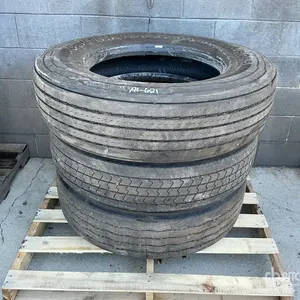Quantity of (3) 11R24.5 Tires w/(2) Wheels