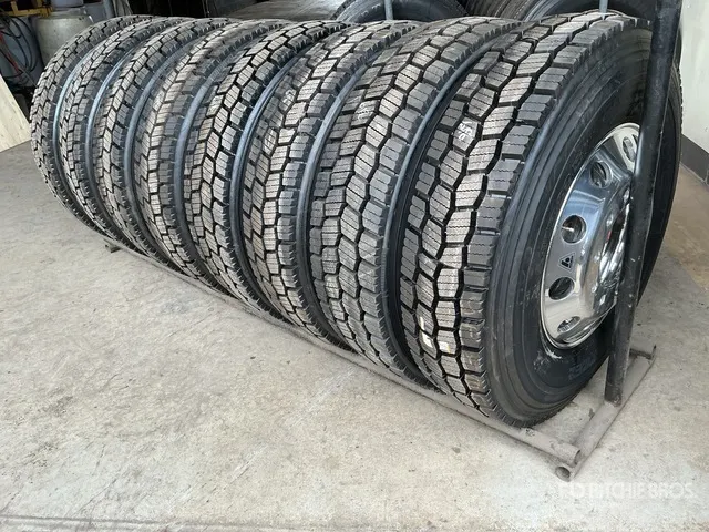 Quantity of (8) 11R22.5 Recapped Tires w/Aluminum Wheels