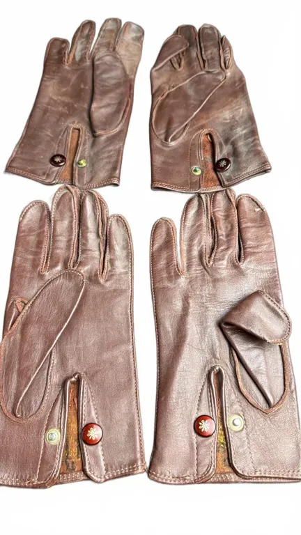 Brown Leather Gloves with Red Button Detail and Yellow Wool Lining