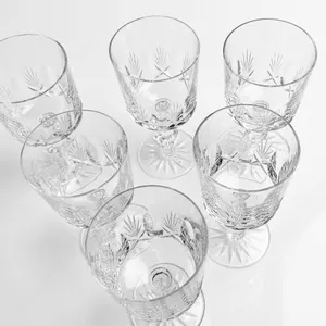 6 Cut Crystal Goblets with Starburst Pattern and Faceted Stems