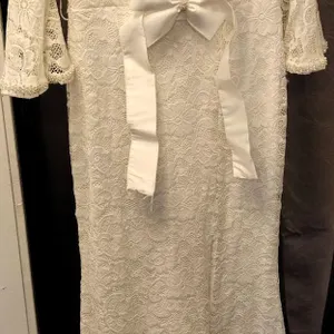 Lace Bridal Gown with Pearl Trim and Bow