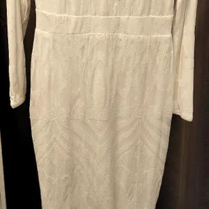 Miss Ord White Sequin Long Sleeve Bridal Gown