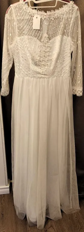 White Bridal Gown with Lace Overlay and Bead Accents