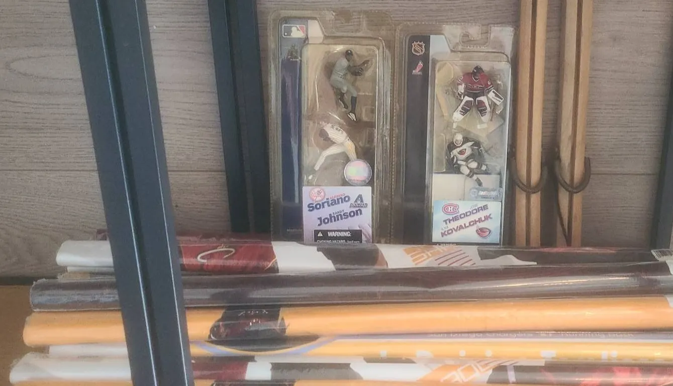 McFarlane Sports Figures, Wooden Ice Skate Clamp, and Sports Posters