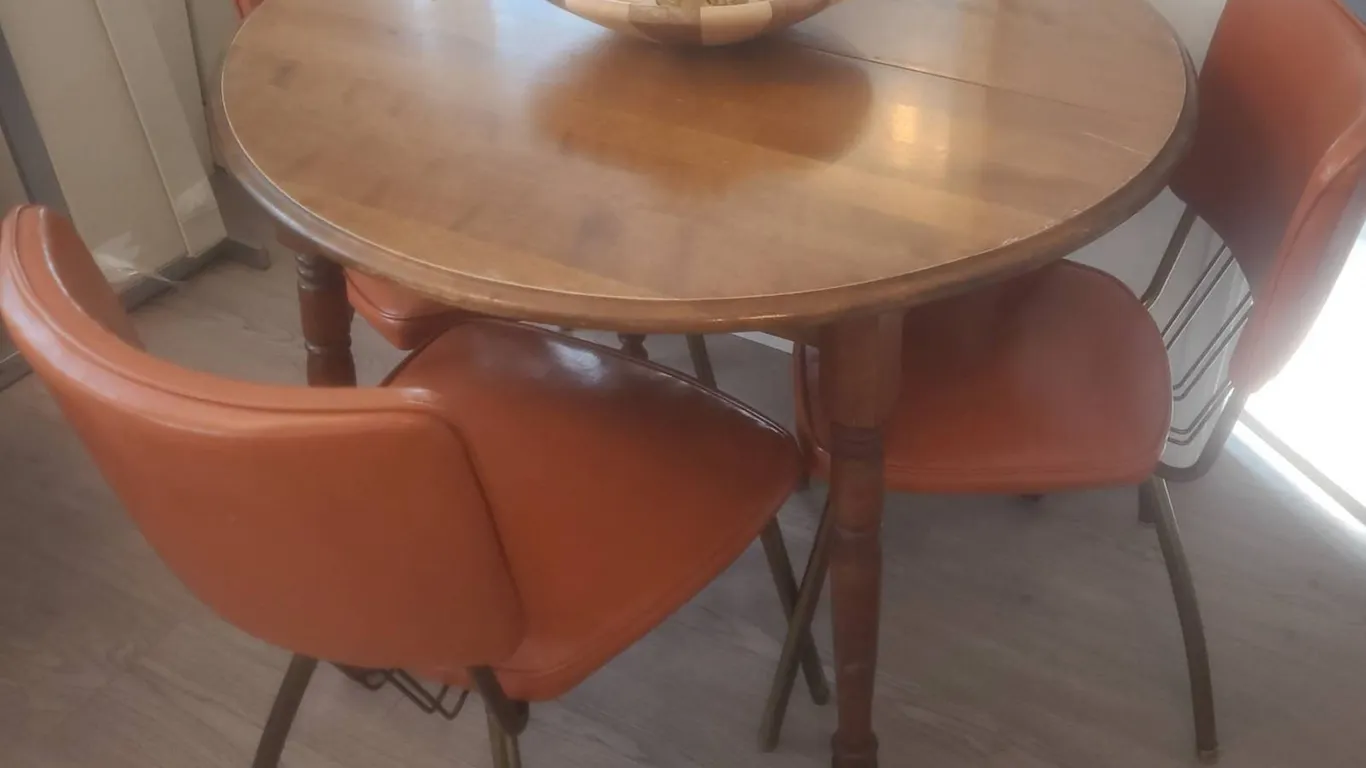 Dining Set: Round Wood Table, 3 Orange Vinyl Chairs