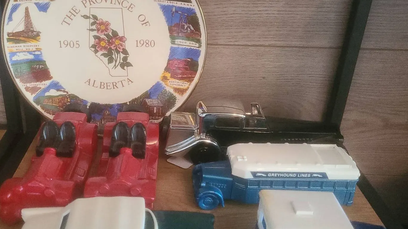 Alberta 75th Anniversary Plate and 6 Avon Car Cologne Bottles