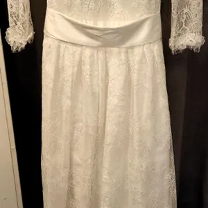 White Lace Bridal Gown with Satin Bow