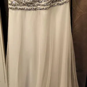 Sleeveless White Bridal Gown with Sequin Bodice