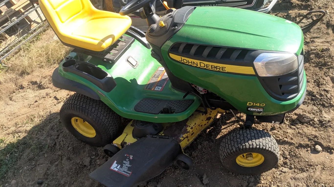 John Deere Lawn Mower, 48” Cut. New Blades, 351 hrs. Use Full Choke to Start.