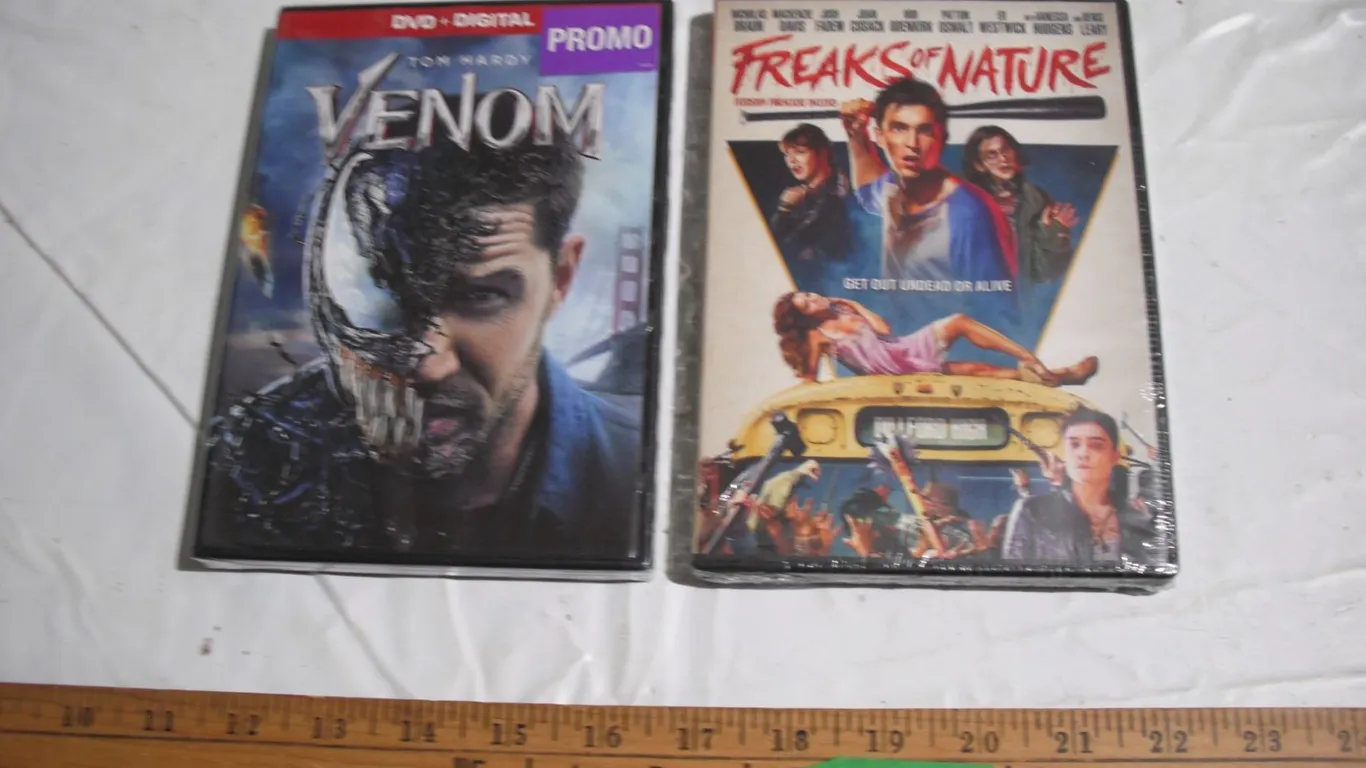 (2) Sealed DVDs