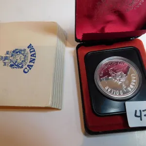 1975 CANADIAN SILVER DOLLAR .500 SILVER, 0.375OZ ASW