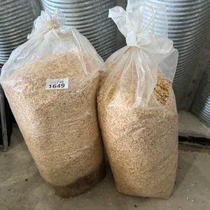 (2) Bags of Wood Shavings (1 Bag Wet on Bottom)