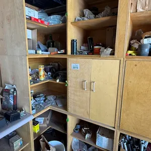 All Corner Cabinet Contents Including a Variety of Plumbing Supplies