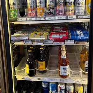 VARIETY OF BEER-BOTTLES AND CANS