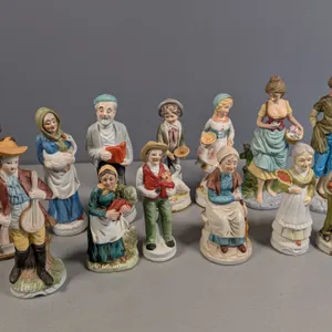 Collection of 13 Ceramic Figurines