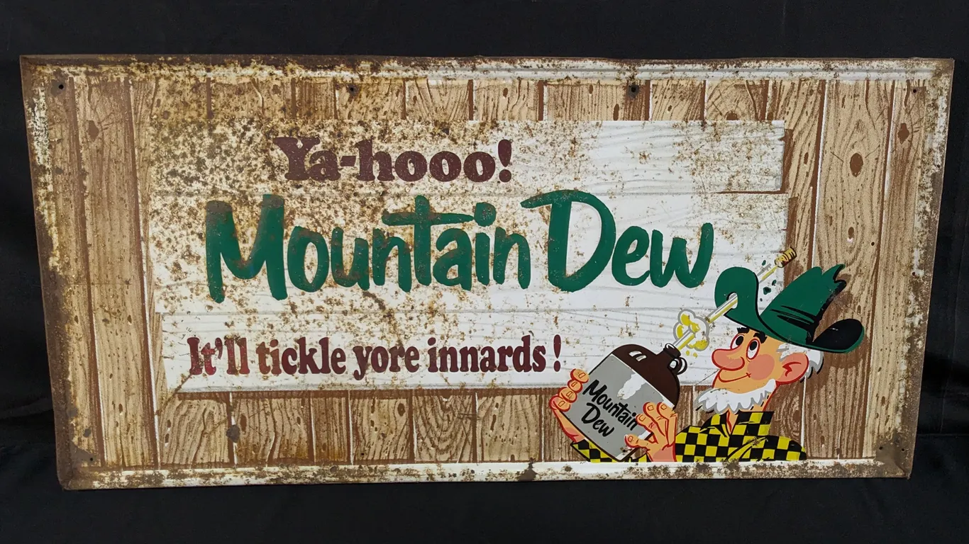 EMBOSSED TIN SIGN YA-HOOO! MOUNTAIN DEW IT'LL TICKKLE YOUR INNARDS!