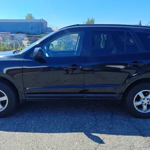 2009 HYUNDAI SANTA FE, AWD 4DR COMPACT SUV, BLACK, VIN 5NMSG73E19H251370,