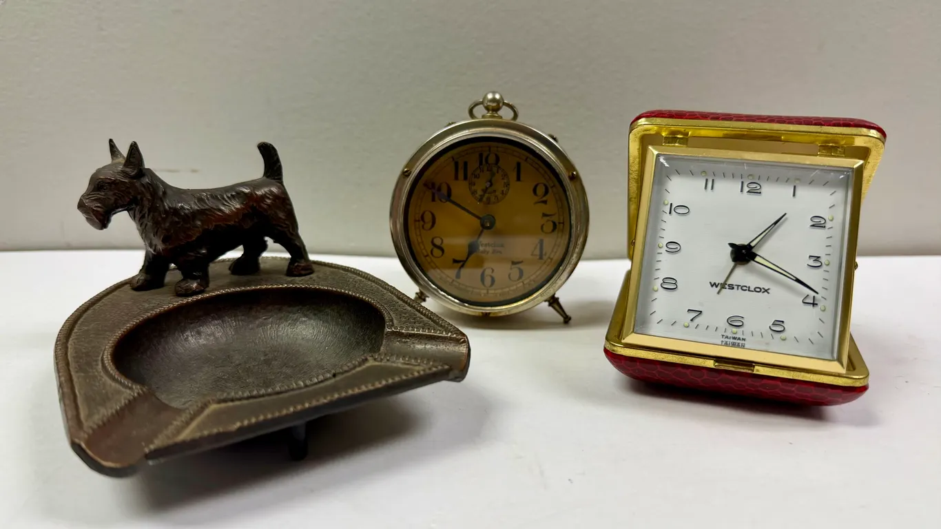 Two Vintage Alarm Clocks & a Terrier on an Ashtry