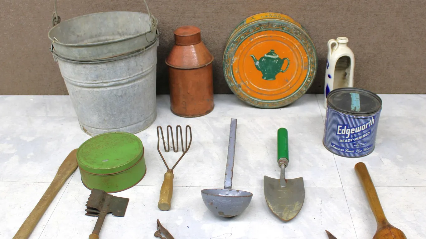 Vintage Tin Cans and Garden Tools