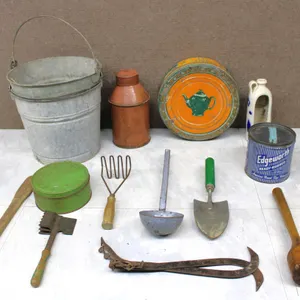 Vintage Tin Cans and Garden Tools