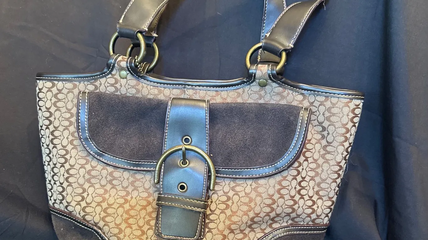 Coach Handbag with Buckle Detail and Patterned Design