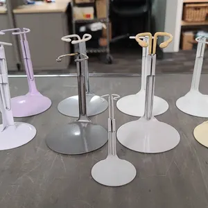 Nine Mixed Metal Doll or Wig Display Stands Assorted Colors