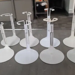 8 White Plastic Doll Display Stands with Adjustable Arms
