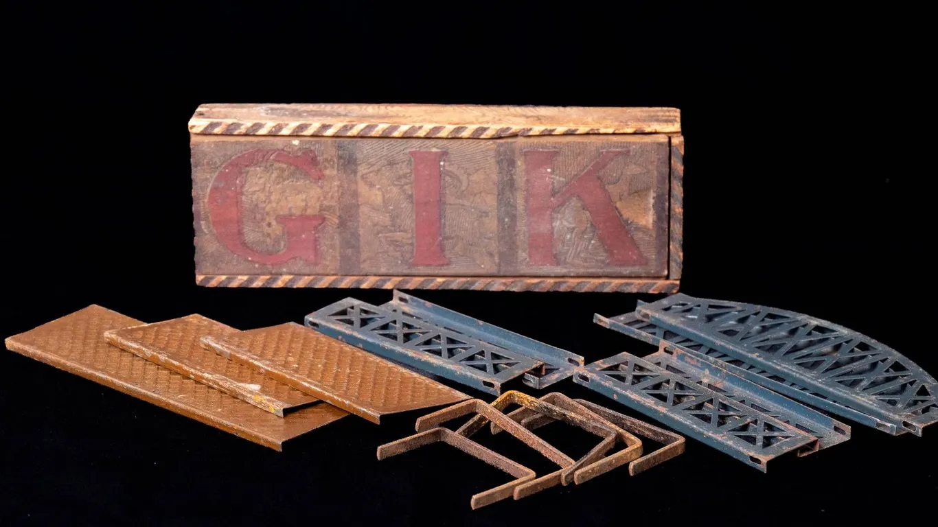 RAILROAD BRIDGE PARTS IN BOX WITH SLIDING LID.