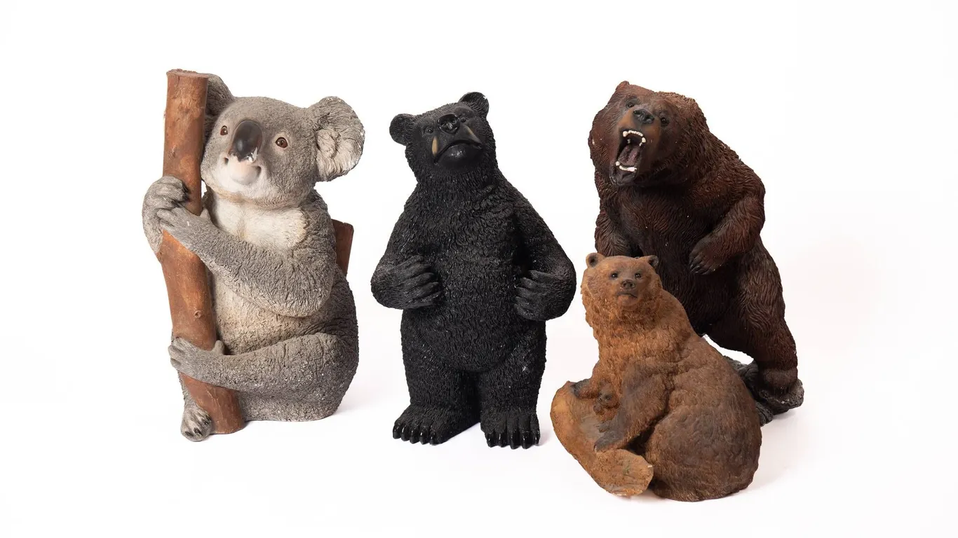 BEAR AND KOALA SCULPTURES IN VARIED MATERIALS.
