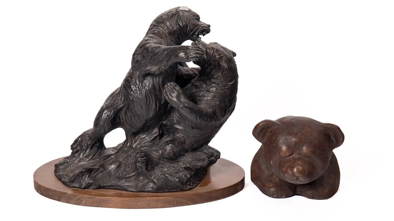 SCULPTURE TITLED "DIFFERENCE OF OPINION" AND BETTY RICE BEAR HEAD.